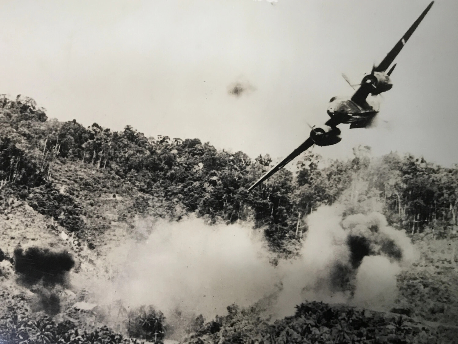 B-25 Mitchell Medium Bomber Banking After Low-Level Attack Run, New Guinea