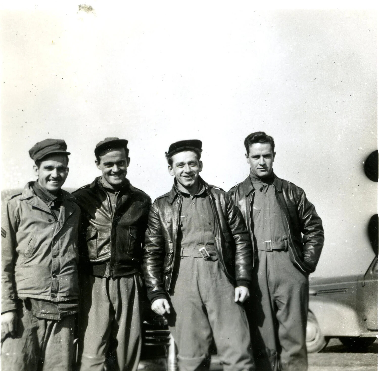 Four Airmen in Flight Jackets, 345th Bombardment Group Photo Album