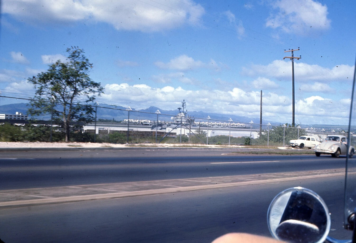 Roadside View of Naval Air Station and Aircraft Carrier, Hawaii, Vietnam War Era
