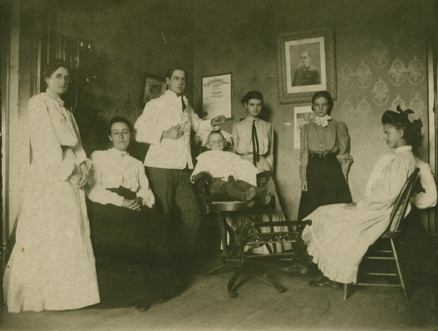 Edwardian-Era Family Group Portrait in Parlor Room (Misfiled in WWII B-24 Collection)