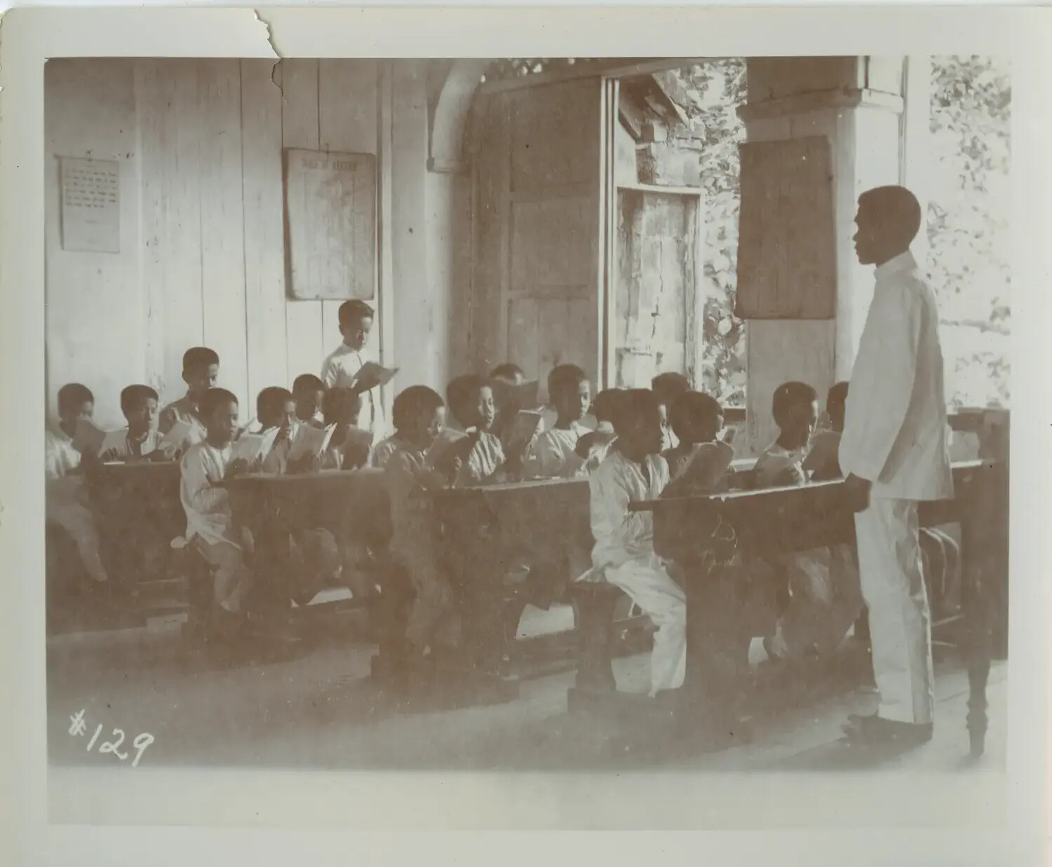 Boys' Classroom with Teacher and Students Reading, Philippines, c. 1890s