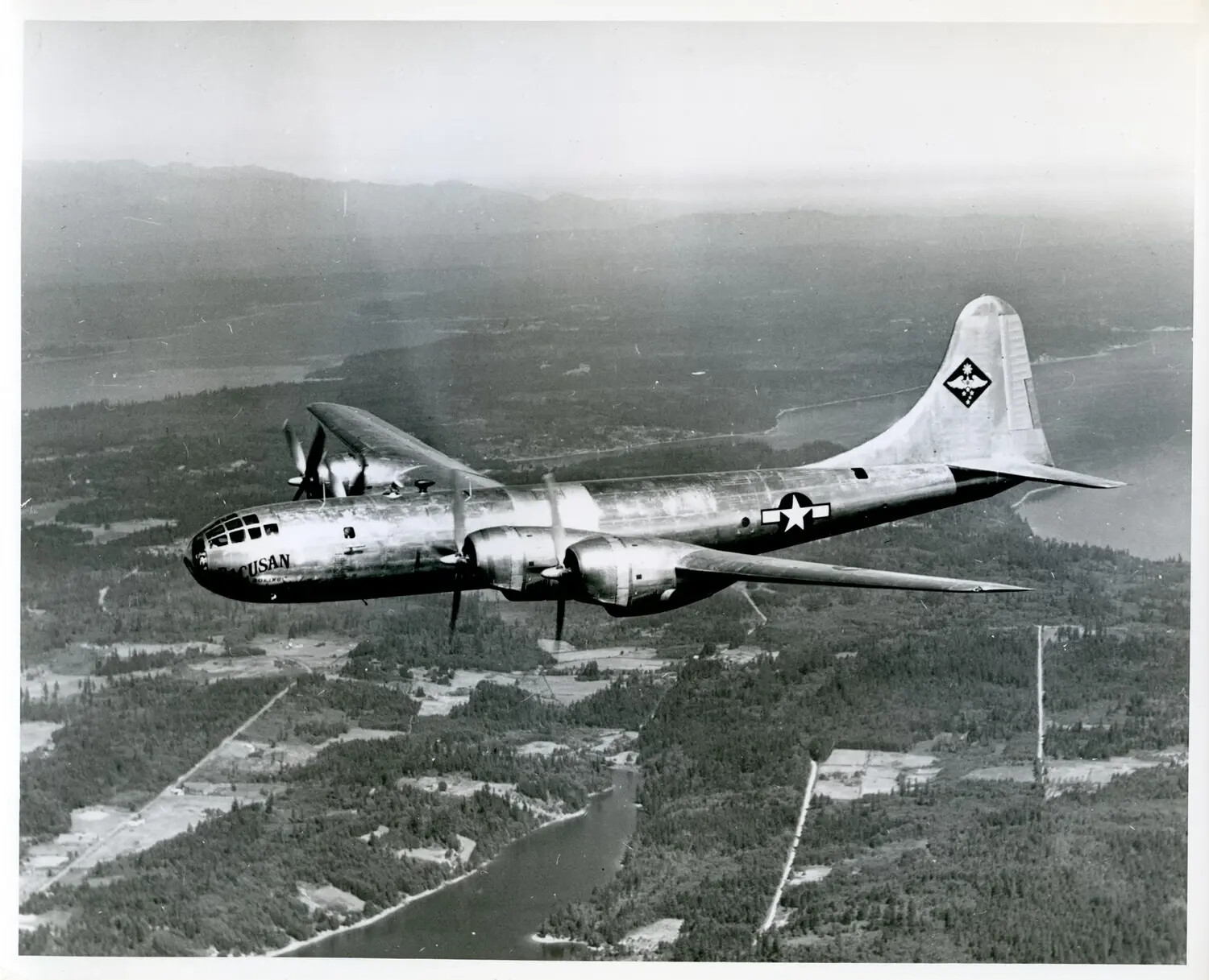 Boeing B-29 Superfortress 'Pacusan Dreamboat' in Flight Over Pacific Northwest Terrain (Postwar Era, c. 1945-1949)