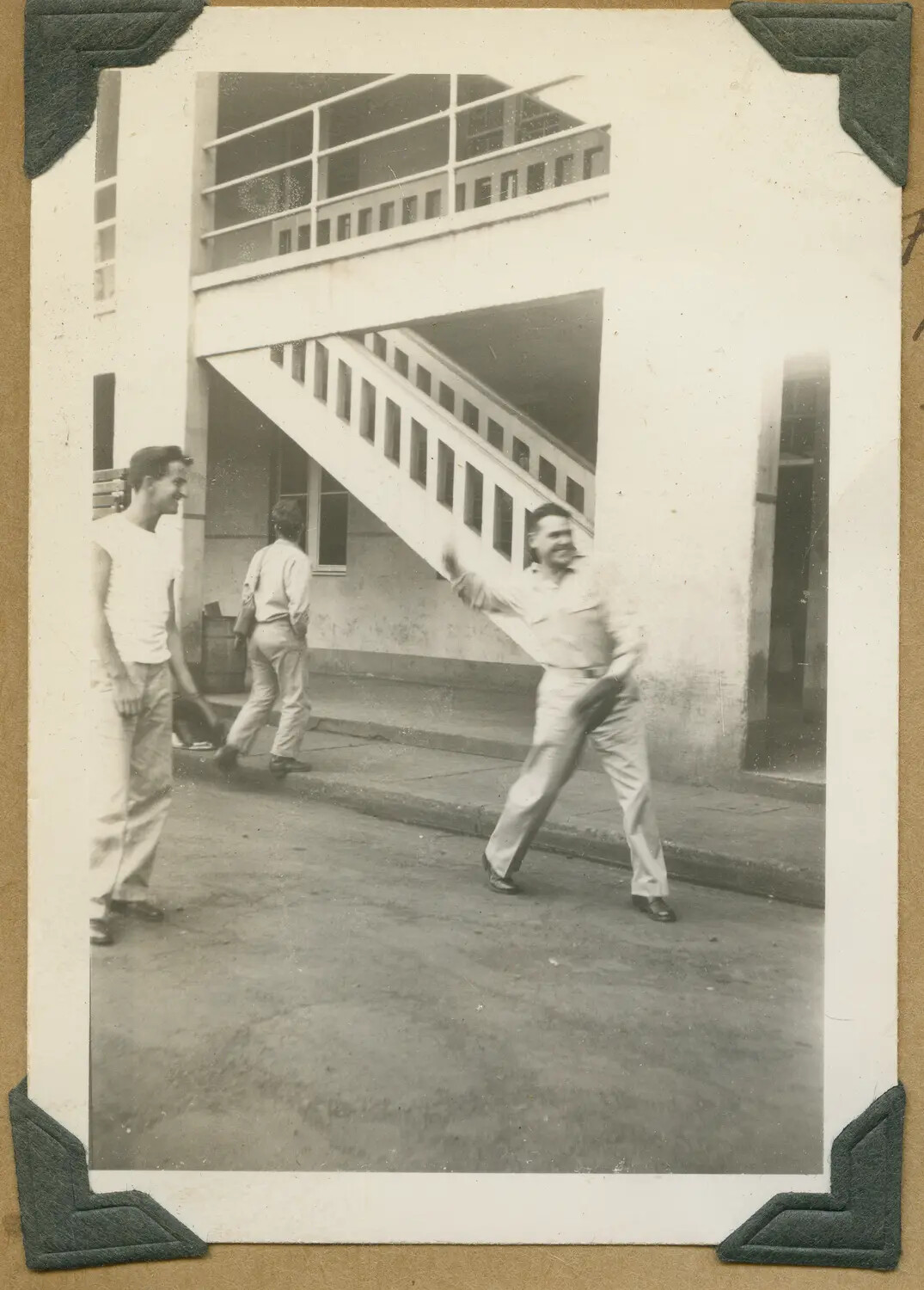 "First Baseman" Mas-Purcelle in Mid-Throw, Barracks Courtyard, Hawaii, WWII