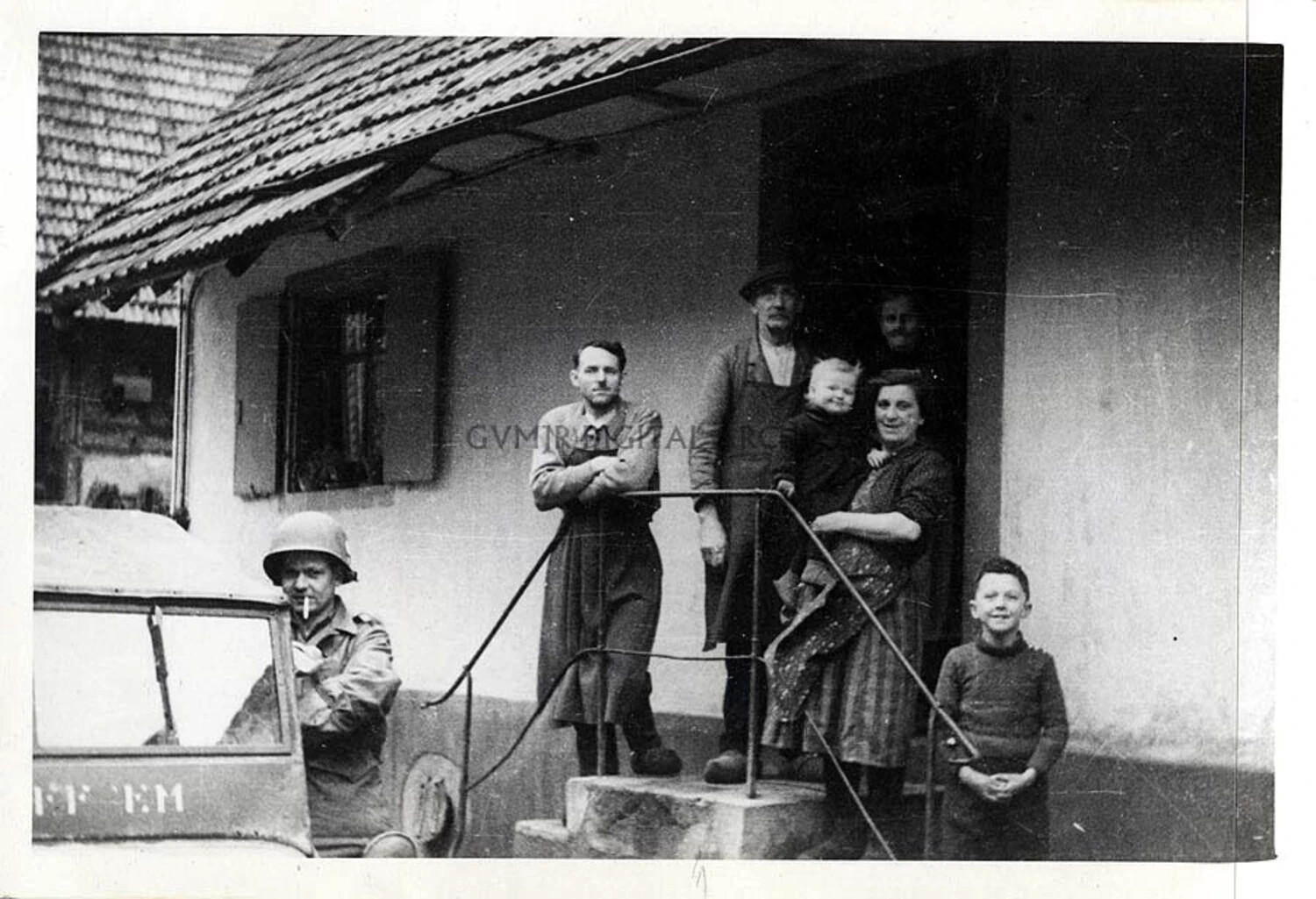 101st Airborne Paratrooper with Local Farm Family, European Theater, WWII