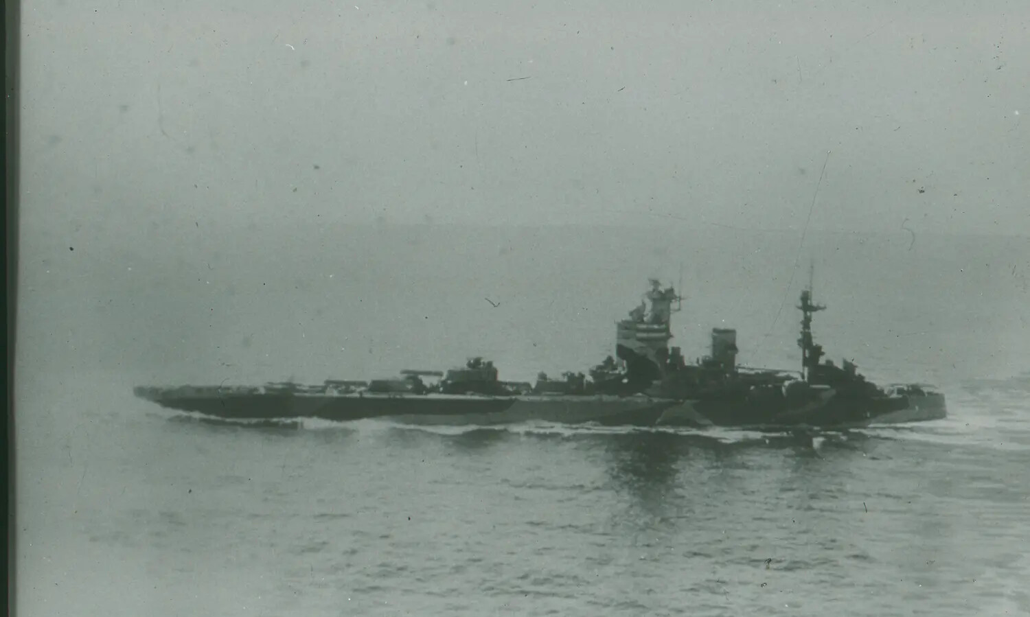 U.S. Navy Warship (Heavy Cruiser Type) Underway at Sea, World War II