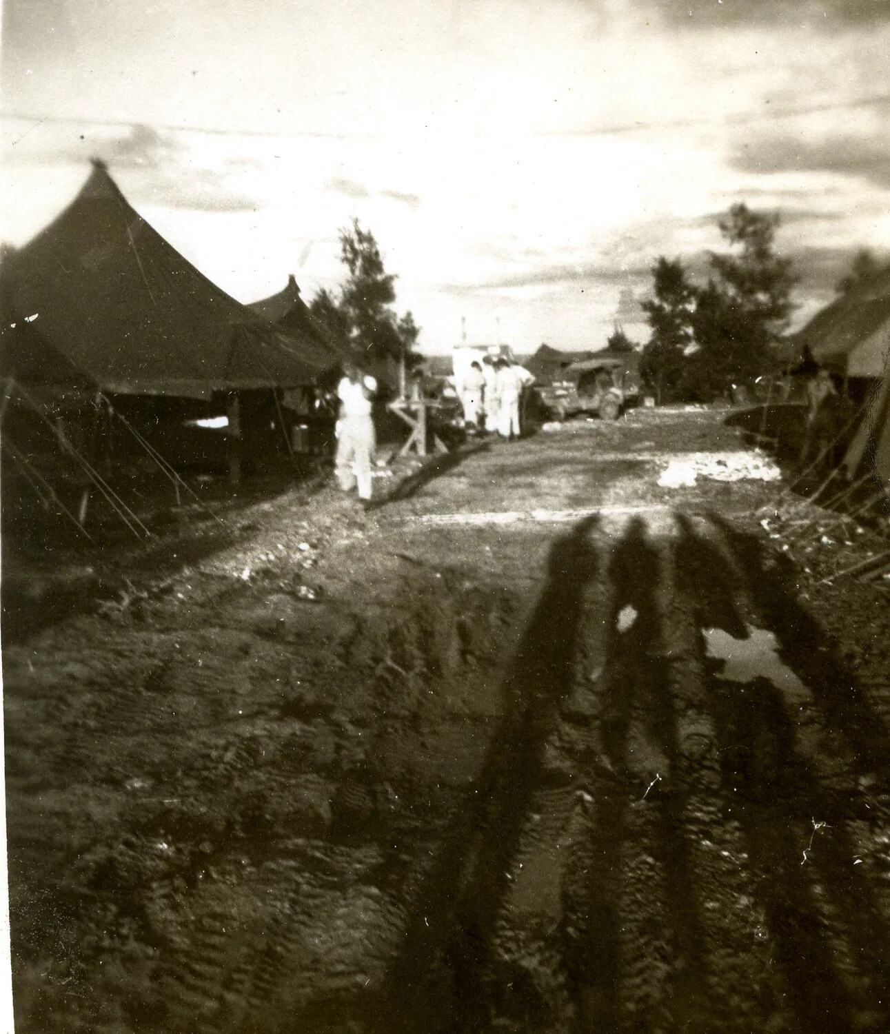 Muddy Camp Road Between Tents at Forward Airbase, 345th Bomber Group, Ie Shima, WWII Pacific Theater