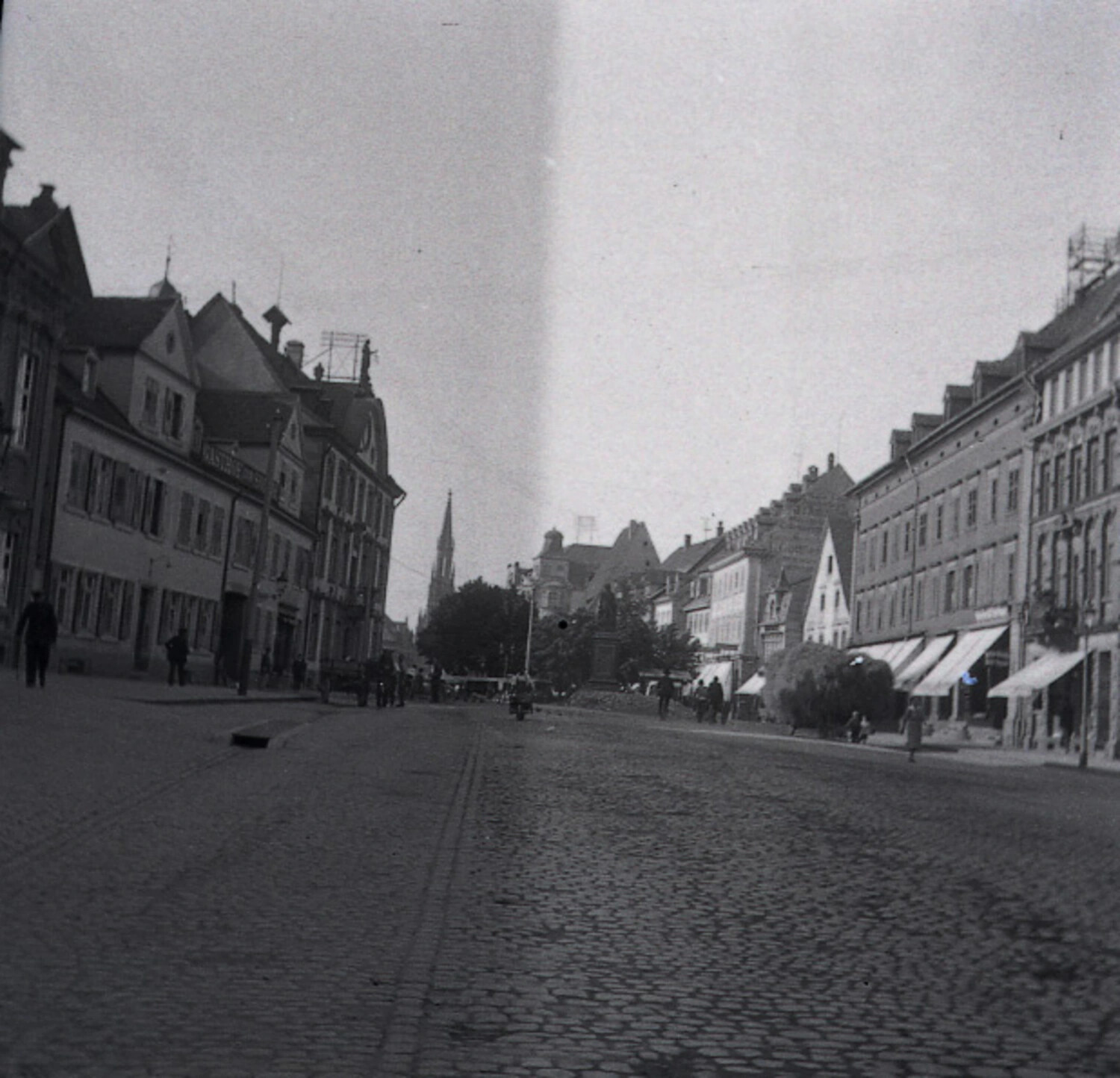 German Town Street Scene with Church Spire and Monument, WWI-Era Negative Collection