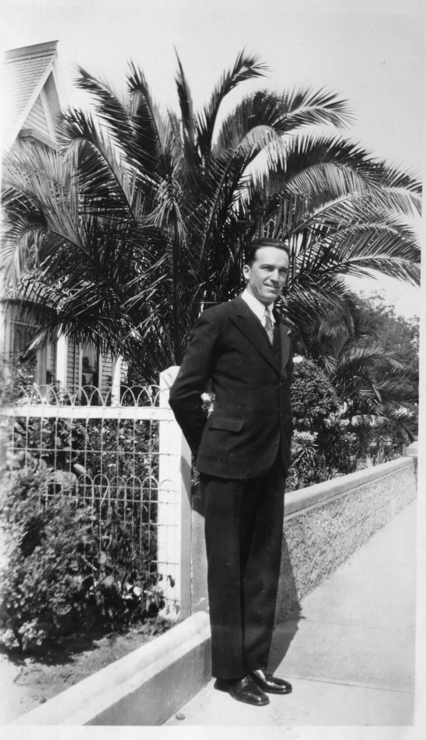 Portrait of a Young Man by a Garden Fence and Palm Tree, circa 1925-1935