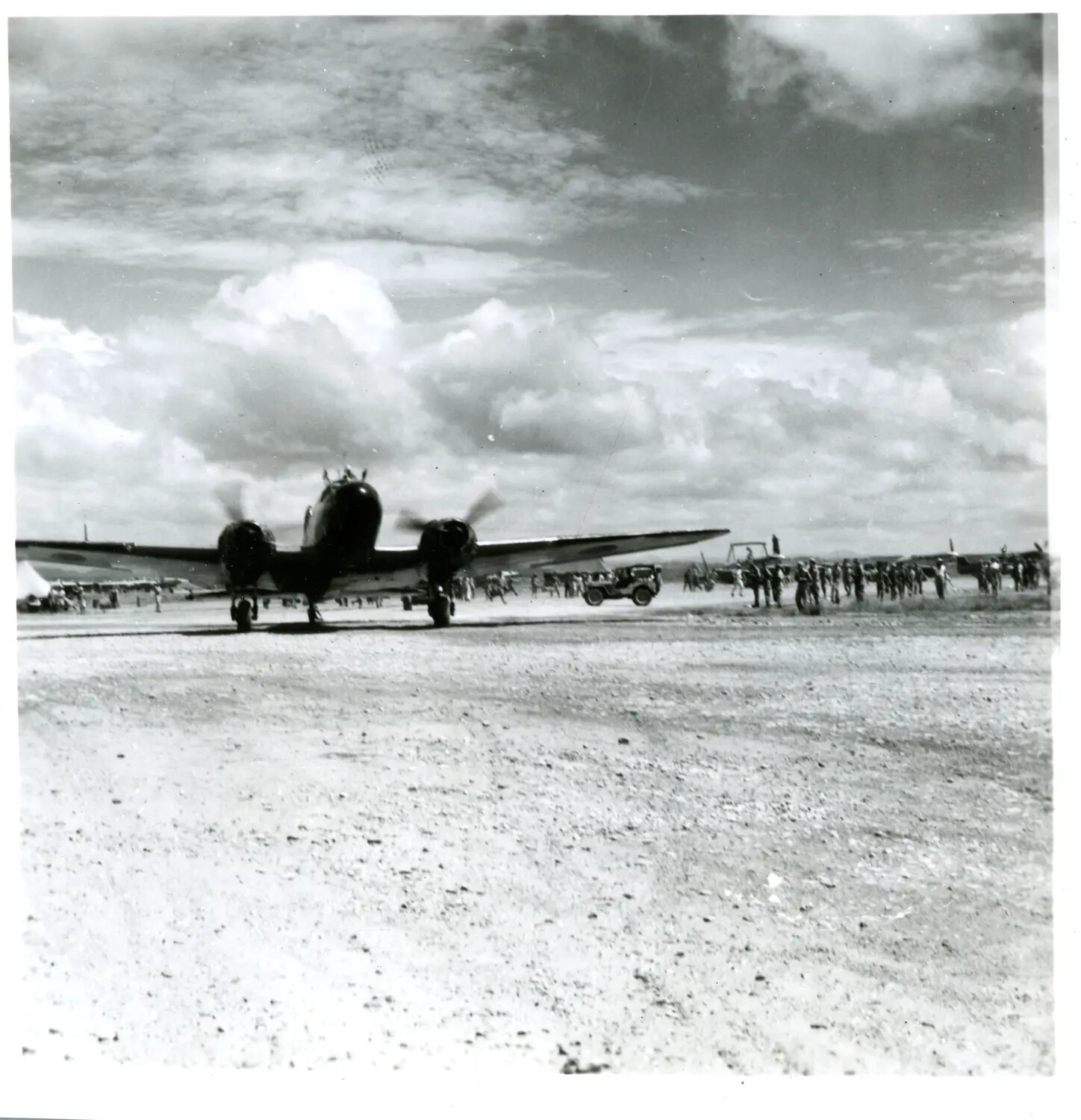 Curtiss C-46 Commando Taxiing on Forward Airstrip, China-Burma-India Theater, WWII