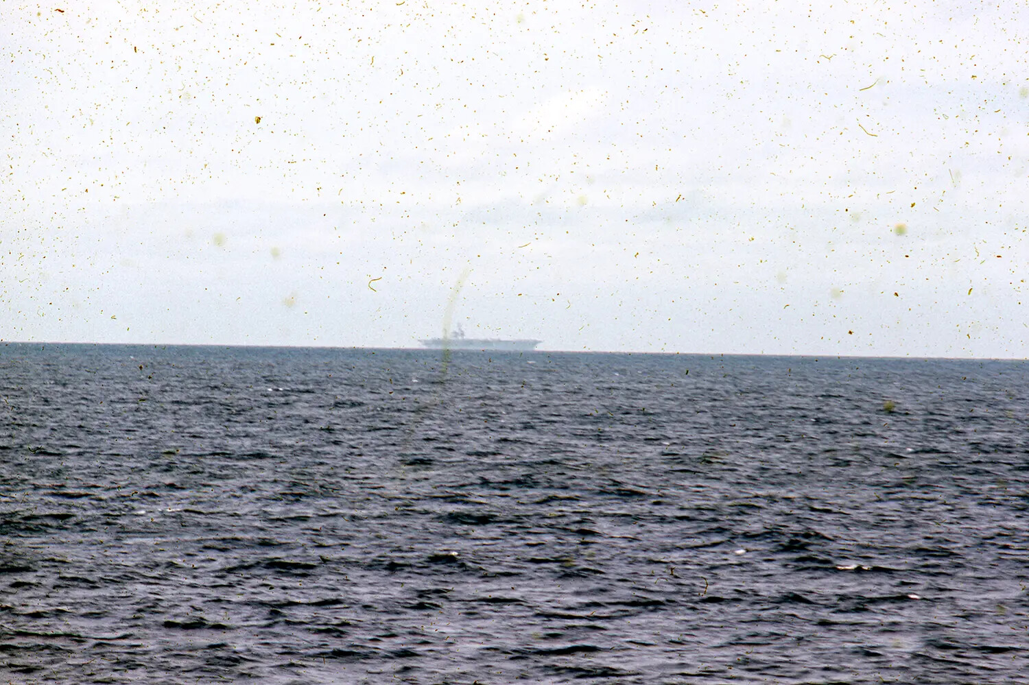 Distant View of Aircraft Carrier at Sea, USS Ticonderoga