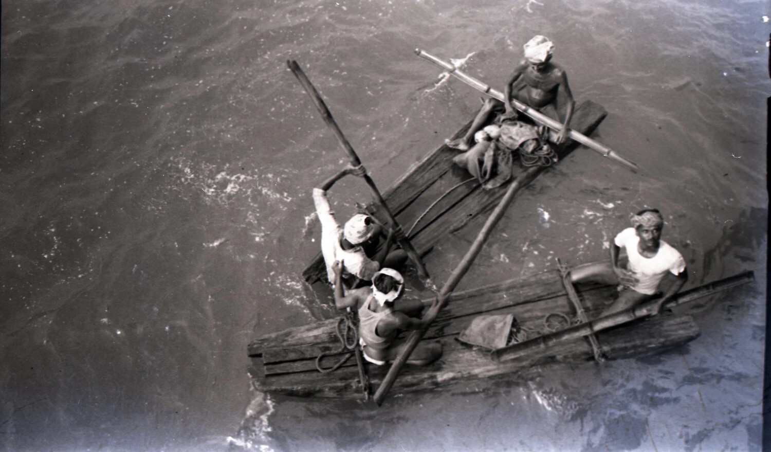 Local Burmese Rivermen Poling Log Rafts, CBI Theater, WWII