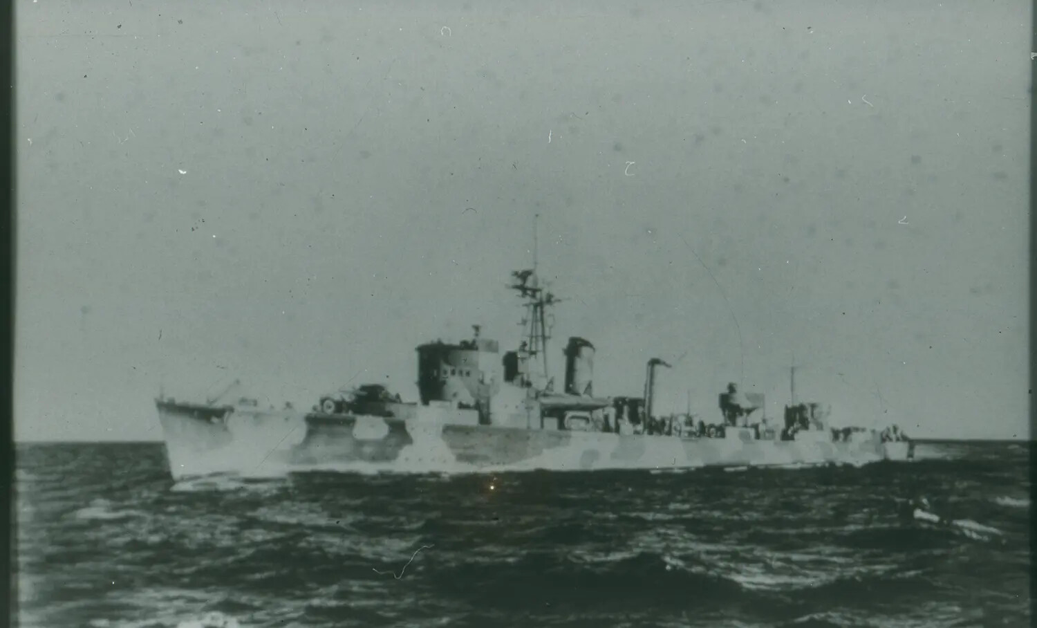 World War II-Era Destroyer Escort Underway at Sea, Broadside View