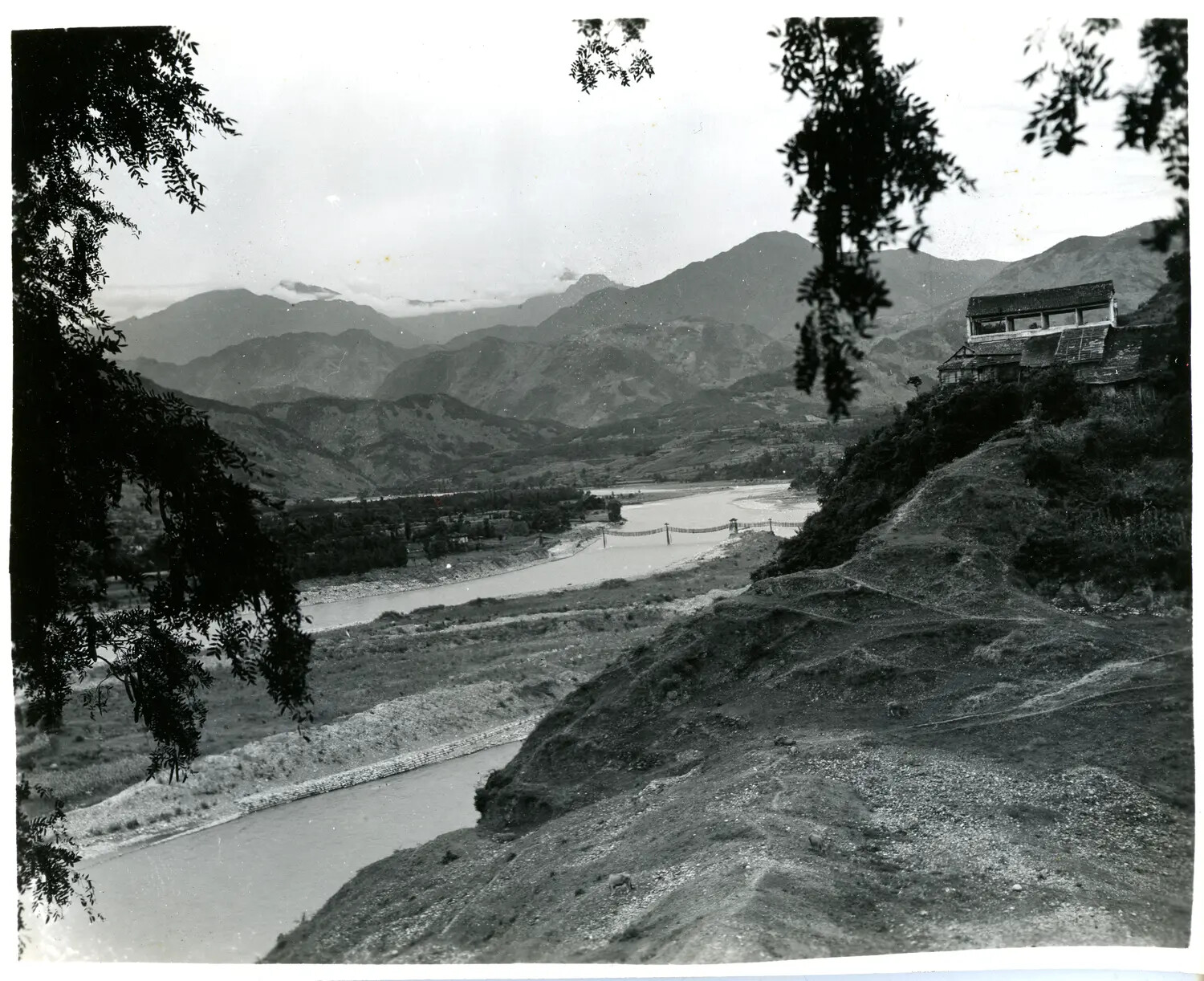 Mountain River Valley with Suspension Bridge, China-Burma-India Theater