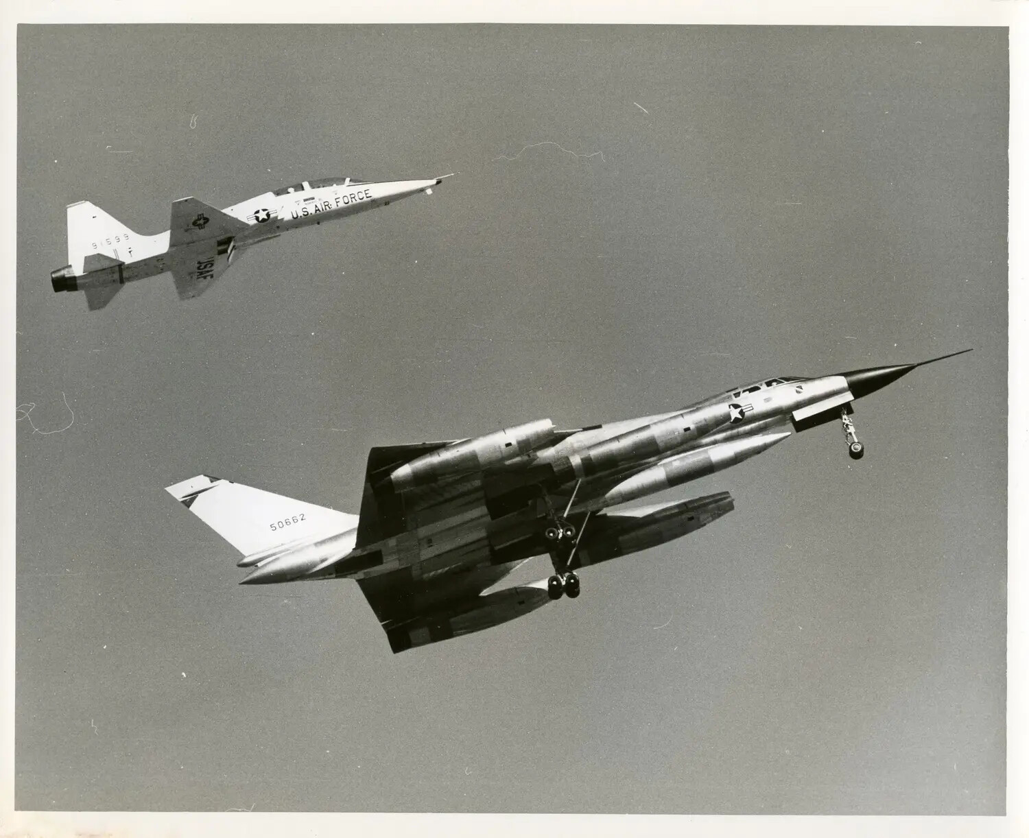 USAF T-38 Talon Chase Aircraft with Convair B-58 Hustler in Flight