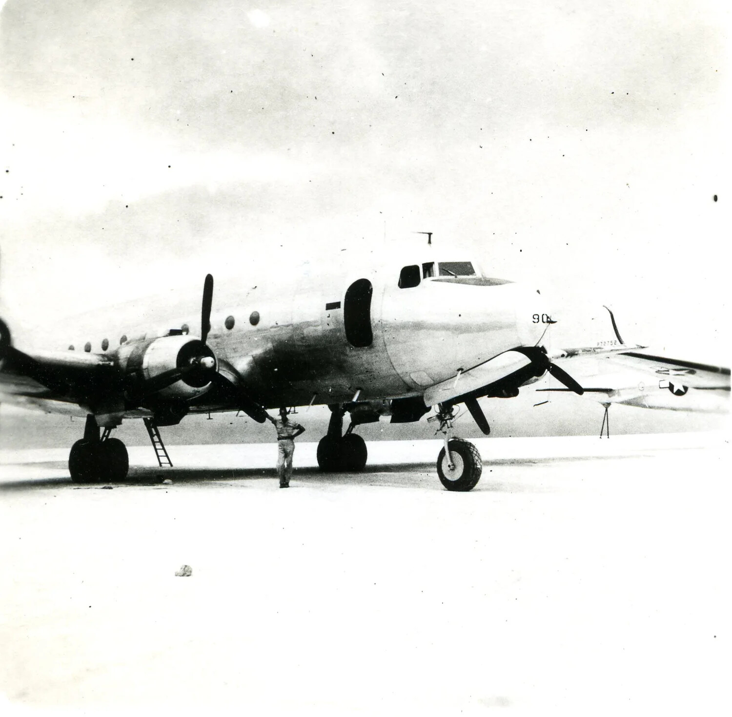 U.S. Military Twin-Engine Transport Aircraft on Airfield Apron, Ie Shima, 1945