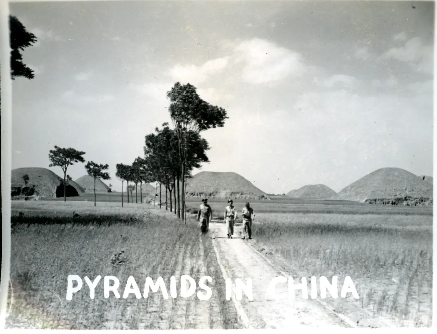 American Servicemen Walking Past Ancient Burial Mounds ("Pyramids in China"), China-Burma-India Theater, WWII