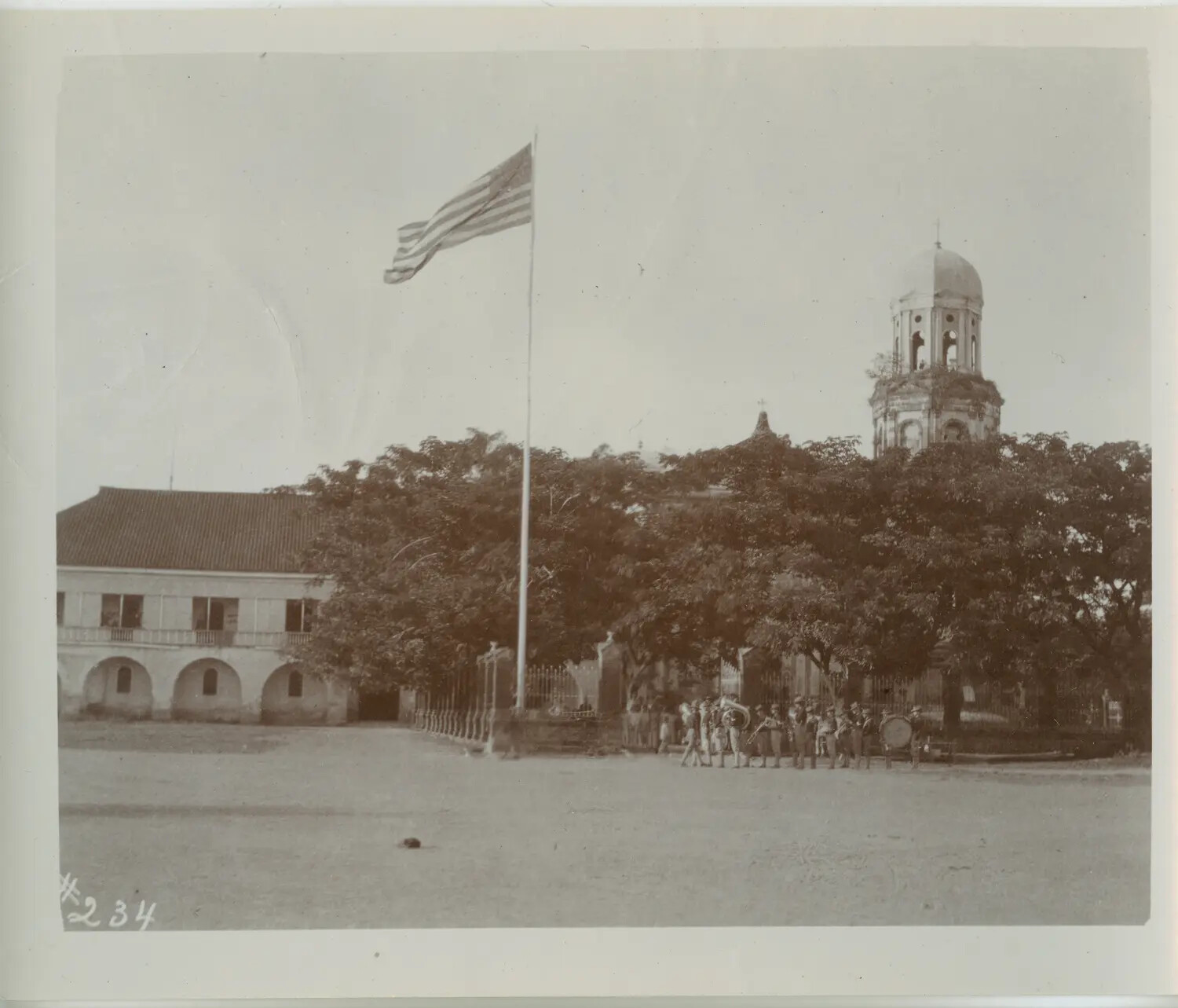 American Flag and Military Band, Spanish Colonial Compound, Philippines, c. 1898-1900