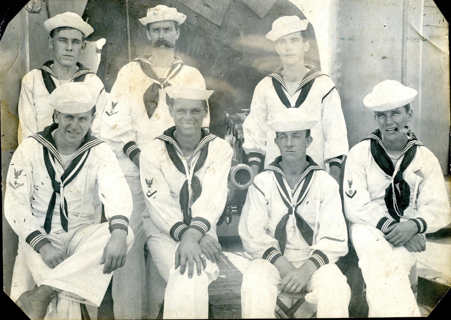 Group Portrait of Sailors in Dress Whites Beside a Deck Gun, USS Columbia