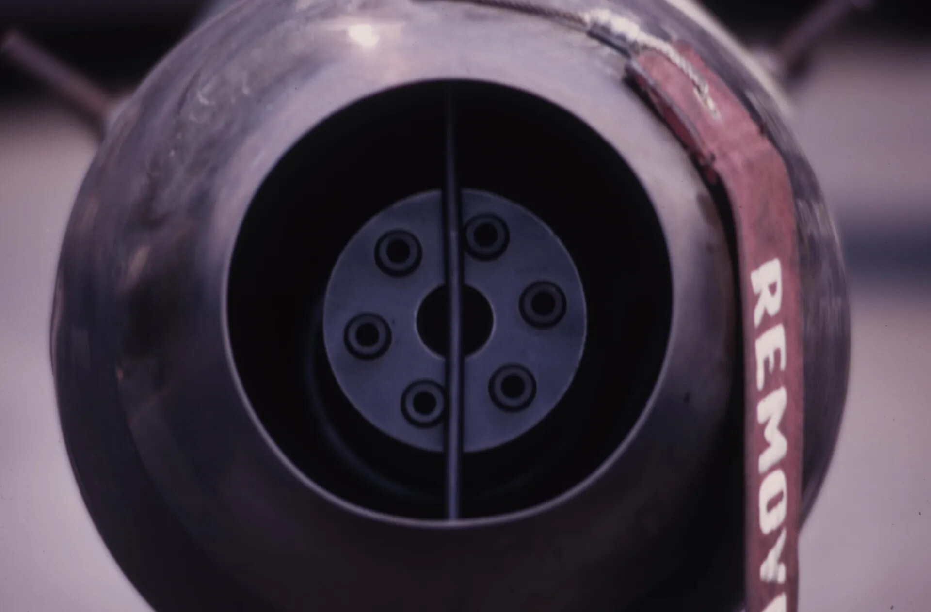 Close-Up of an Aircraft Weapons Pod Muzzle with REMOVE BEFORE FLIGHT Streamer — Vietnam-Era Colour Slide