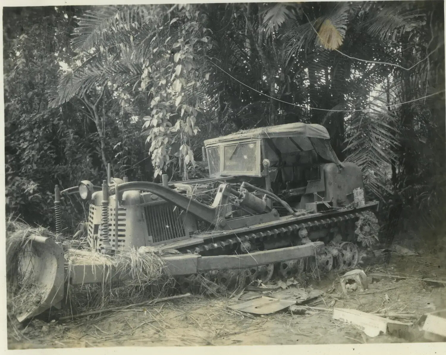 Camouflaged Crawler Tractor/Bulldozer in Jungle Setting, 312th Bomb Group Area of Operations
