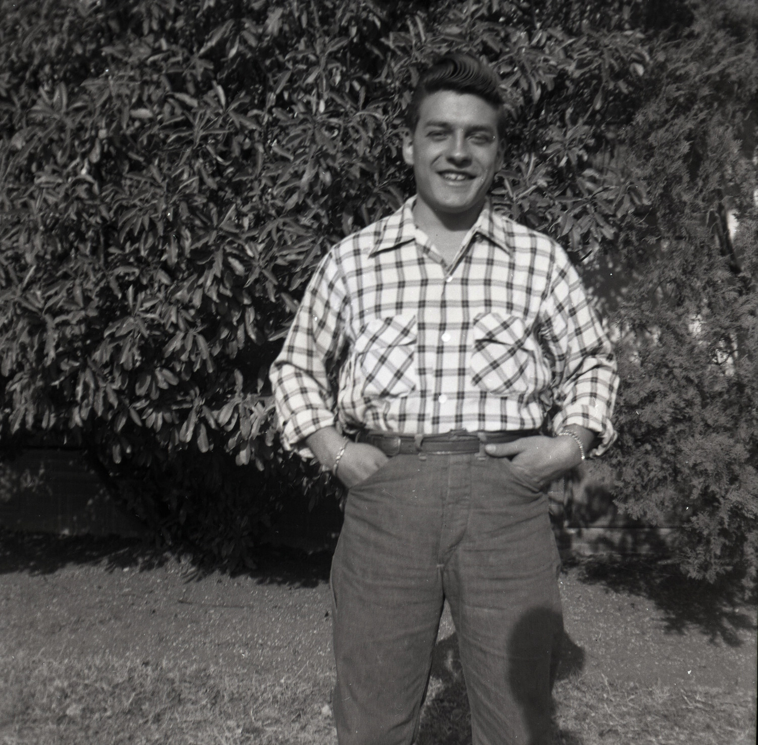 Backyard Portrait of a Young Man in Plaid Shirt, Haidet Family Collection