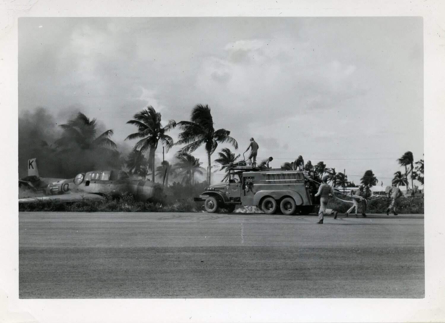 Naval Air Transport Squadron VR-6 Crash Crew Responds to Burning Aircraft, Agana, Guam