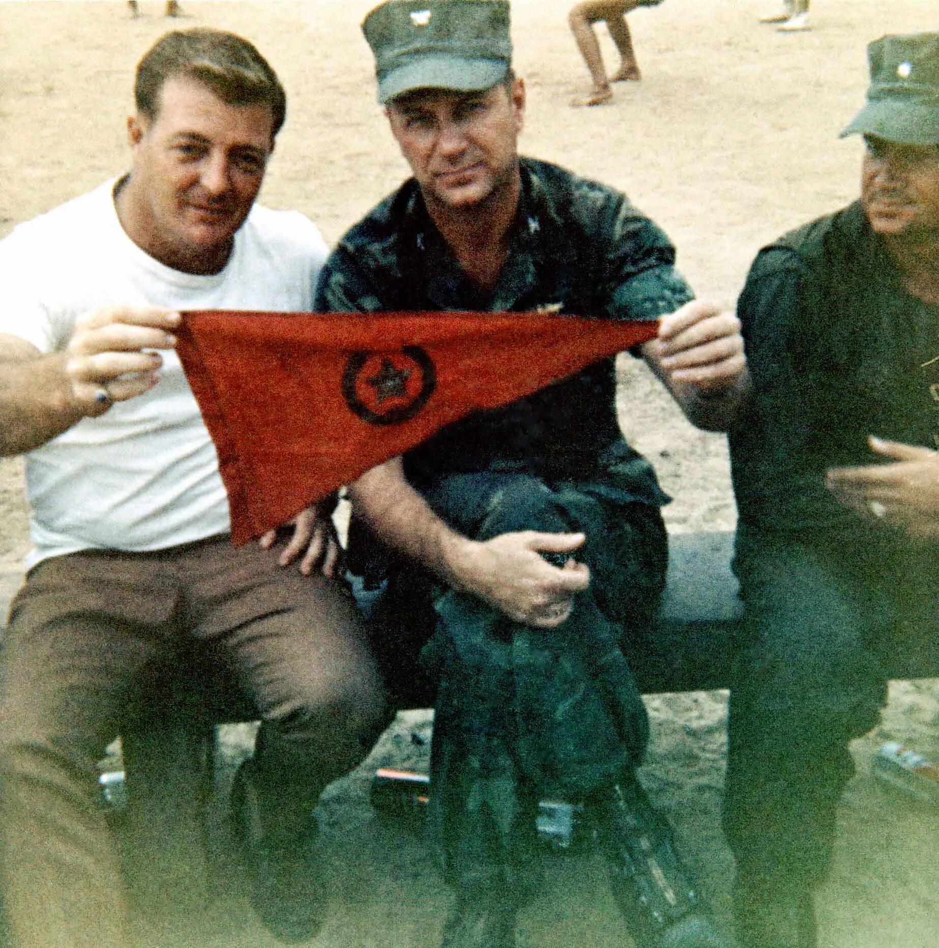 MACV-SOG Personnel Display Captured Enemy Pennant, Gene McCarley Collection (Operation Tailwind Era)