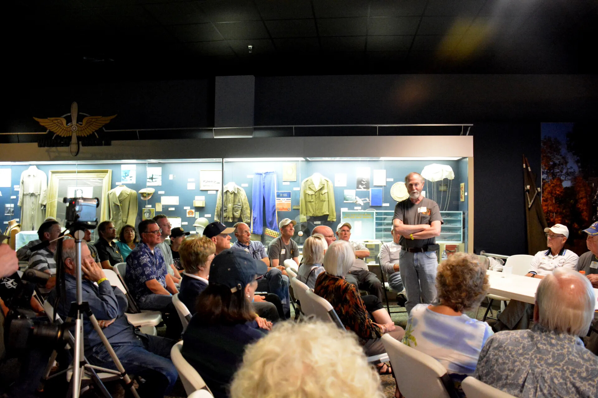 Veterans' Reunion Meeting, Aviation Museum "World War I" Gallery — Speaker Addressing Seated Audience