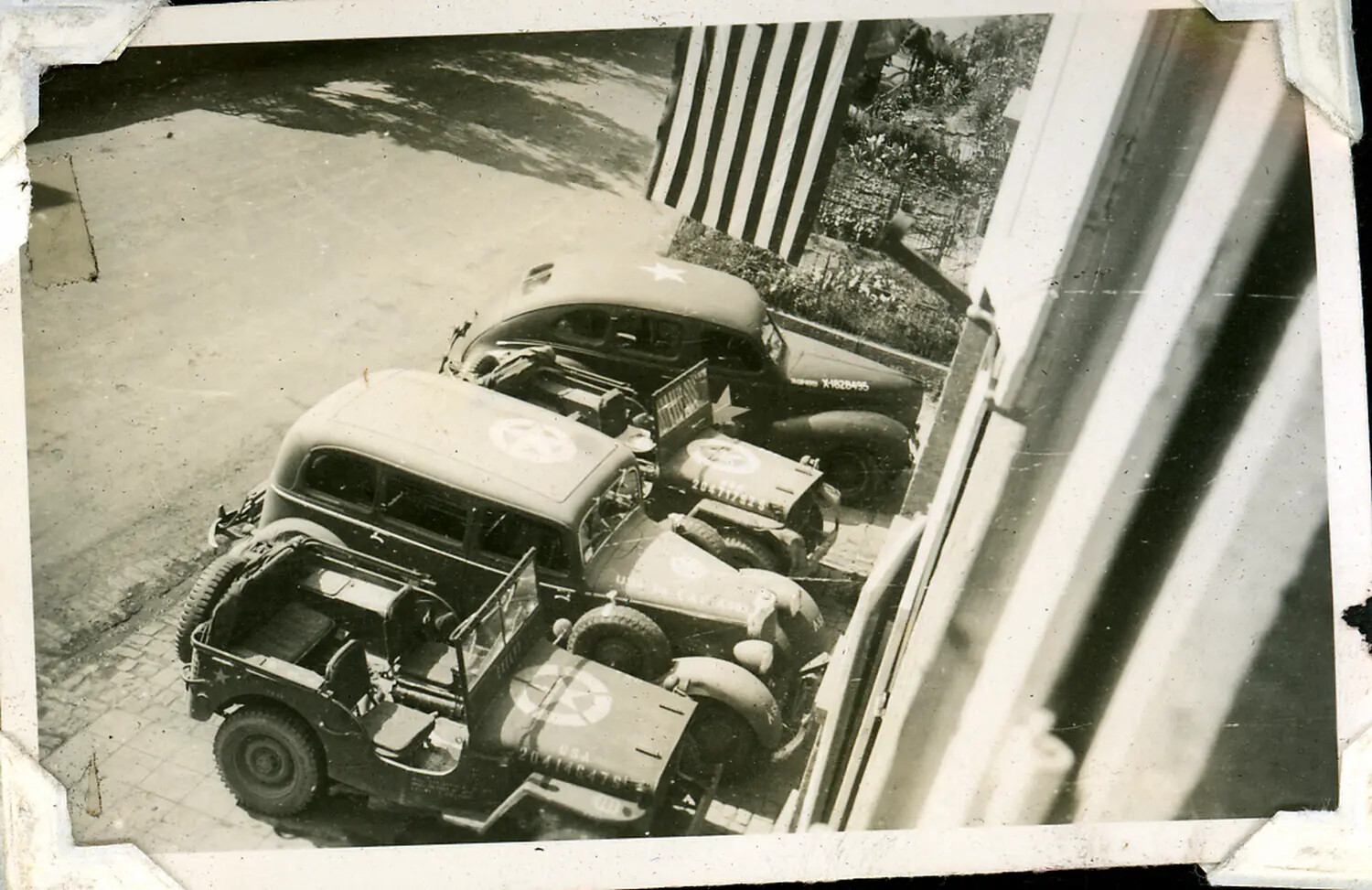 U.S. Army Motor Pool Vehicles Parked at a European Headquarters Building, WWII/Post-War Era