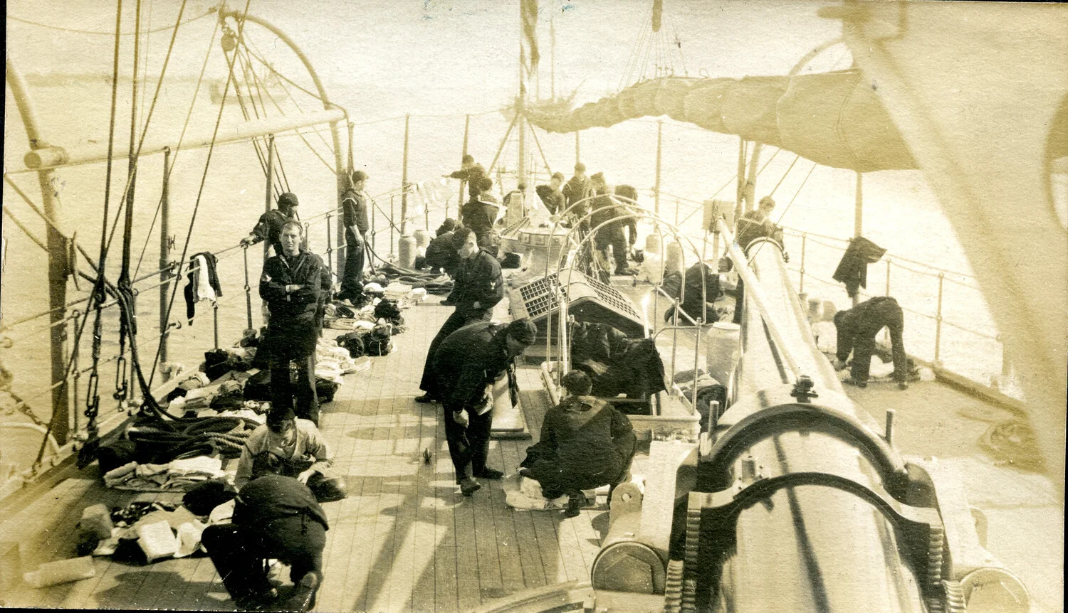 U.S. Navy Sailors Performing Laundry Call on Cruiser Deck, USS Columbia Album