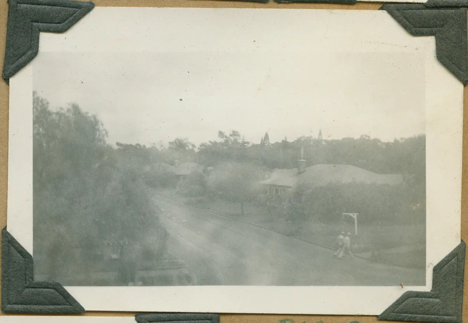 Hazy View of Residential Street with Pedestrians, Oahu, Hawaii, World War II Era