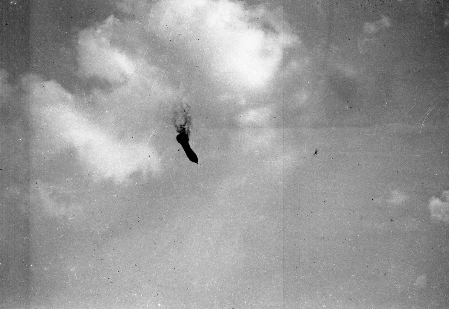Burning Airship (Dirigible) Descending Through Clouds, WWI Era