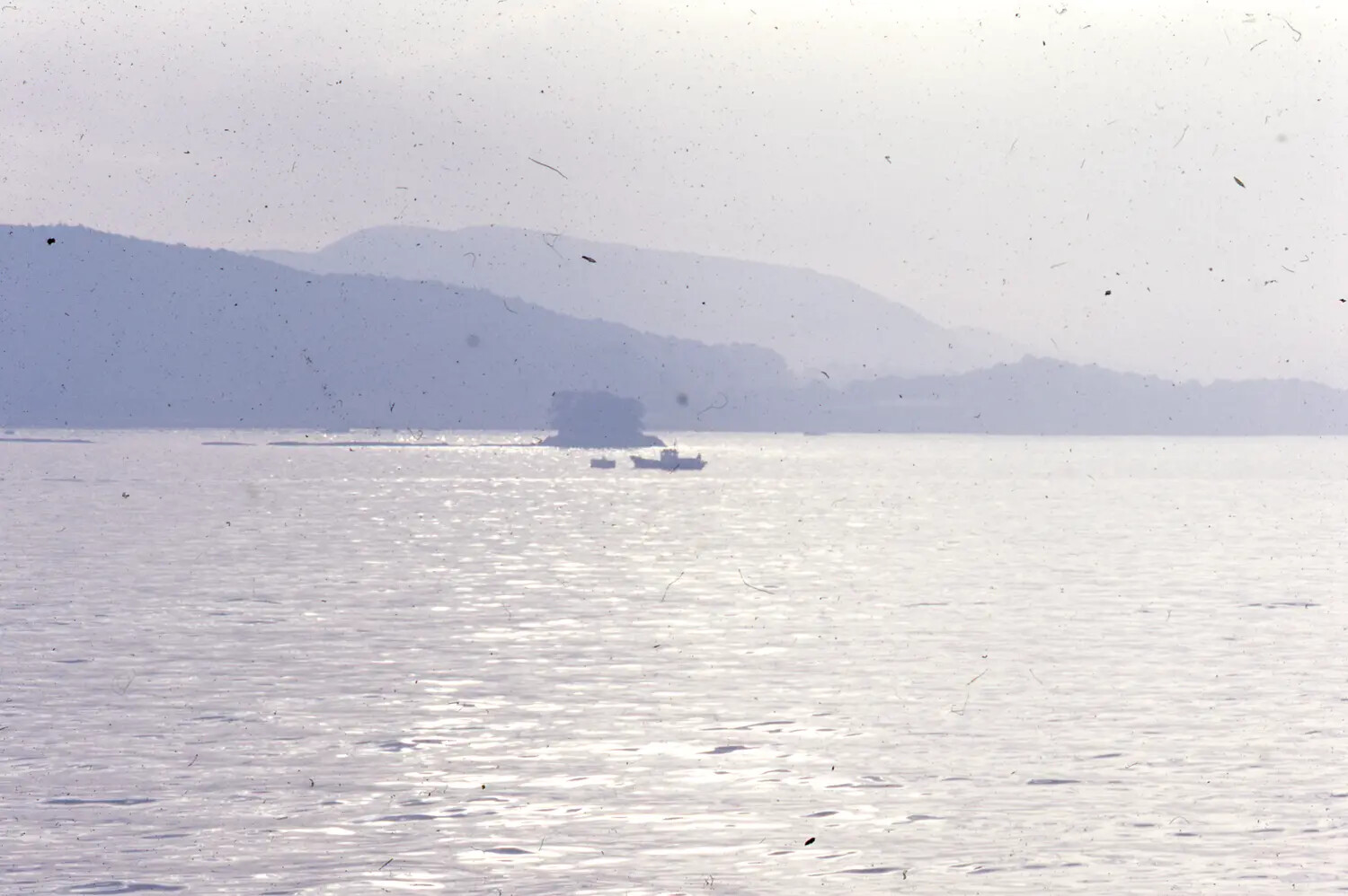 Hazy Coastal Seascape with Fishing Boat, Japan, Vietnam War-Era Slide