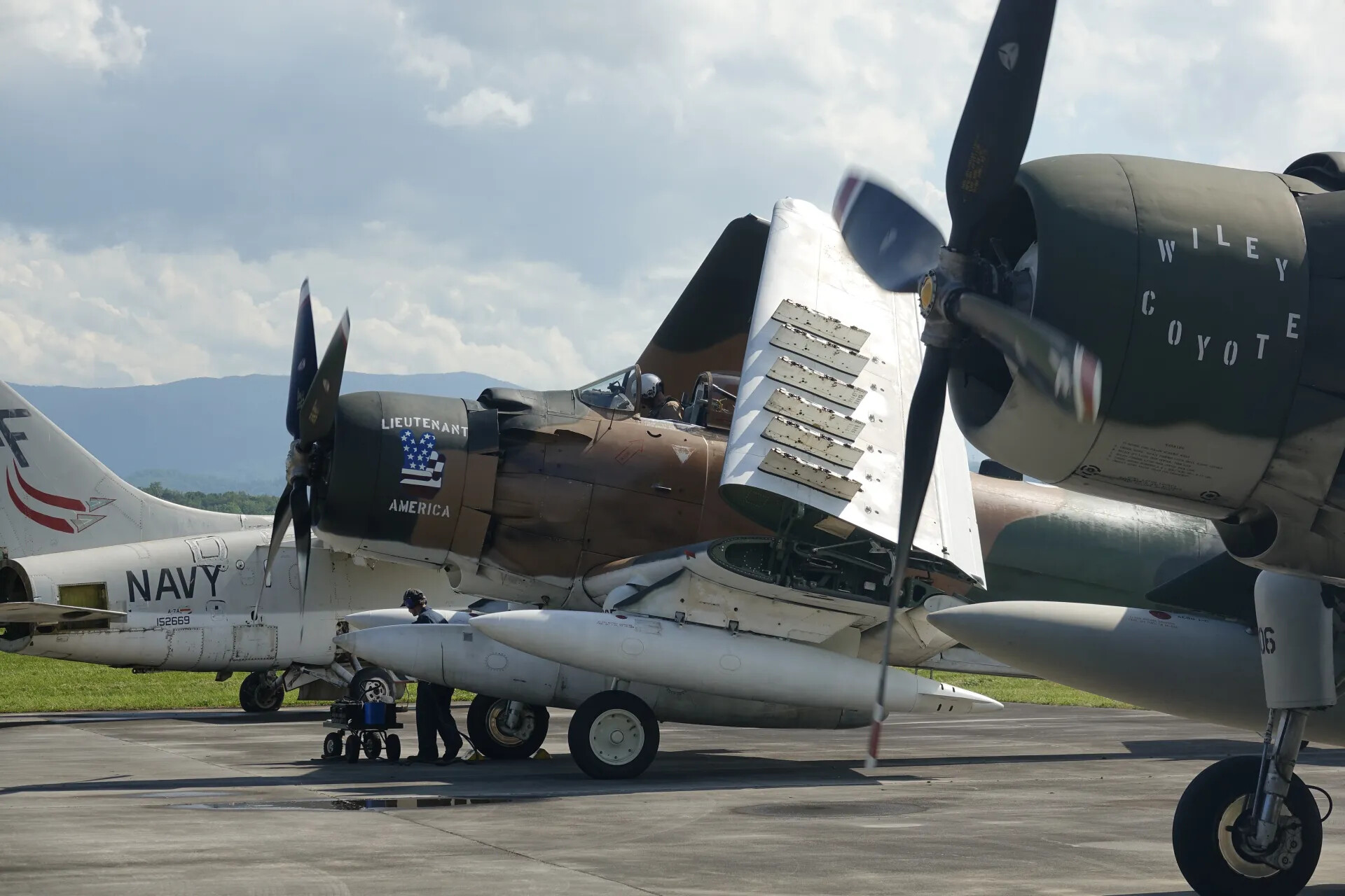 A-1 Skyraider "Wiley Coyote" Engine Running, Ground Crew Attending Nose Gear