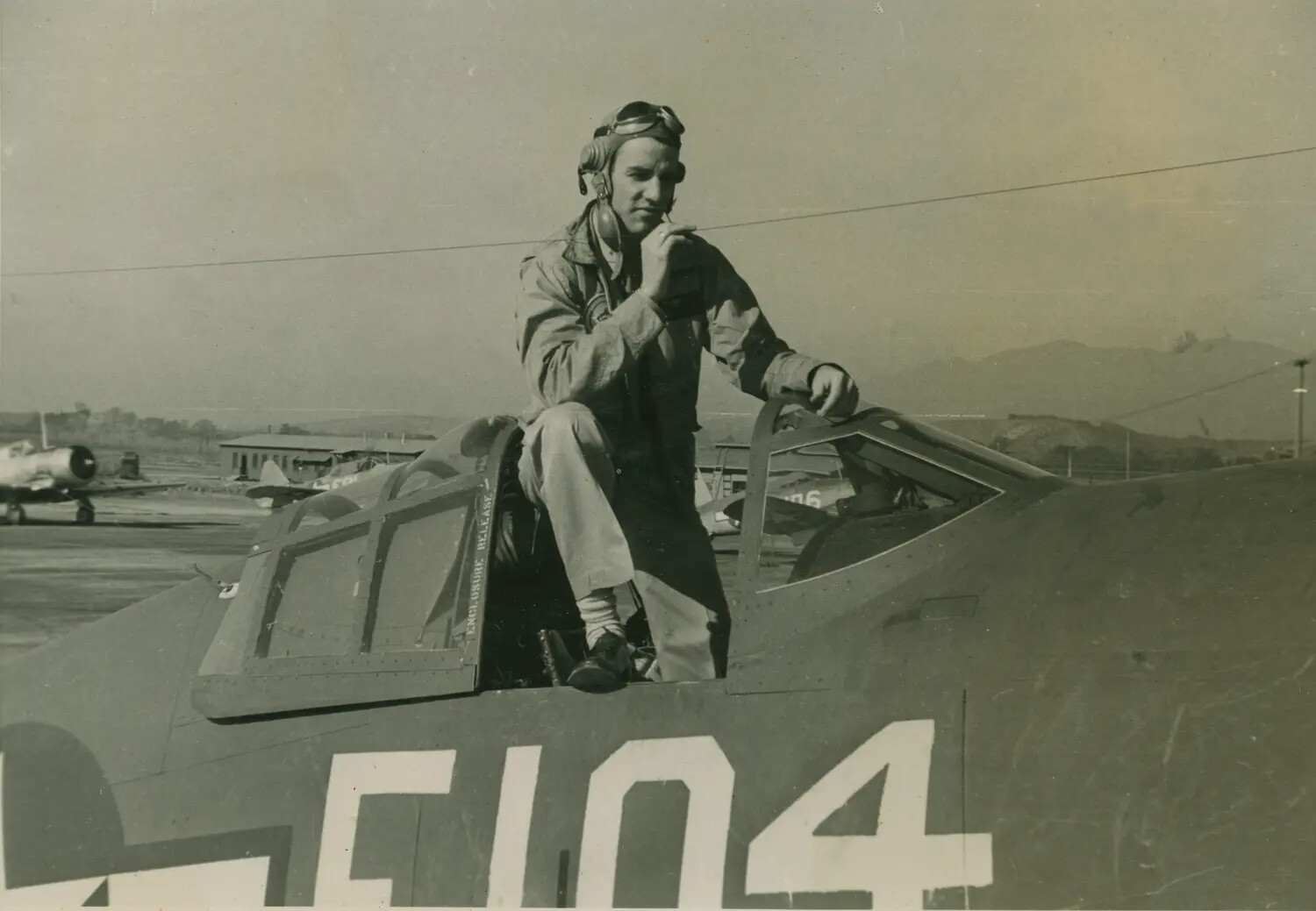 USAF Pilot in Cockpit of F-51 Mustang Fighter, 'F104,' Korean War Era
