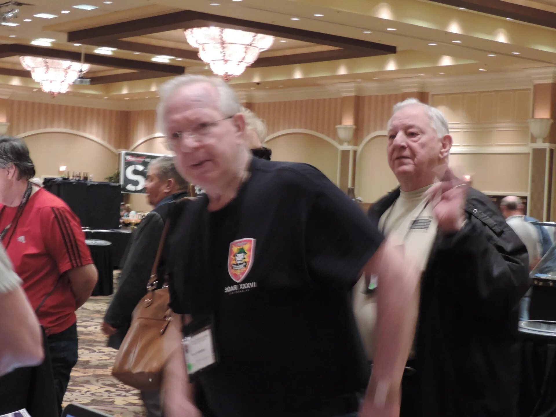 Member in a SOAR XXXVI Shirt Moving Through the Reunion Hall, Special Operations Association Reunion, Las Vegas, 2013 (Blurred Exposure)