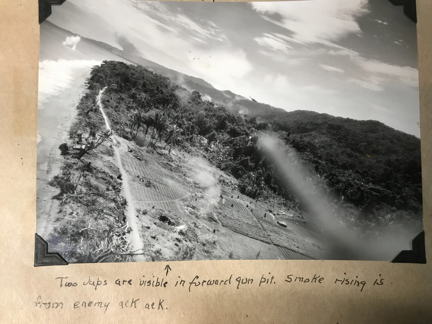 Low-Level Attack Photograph Under Enemy Anti-Aircraft Fire, New Guinea (Annotated: Japanese Gun Pit Visible)