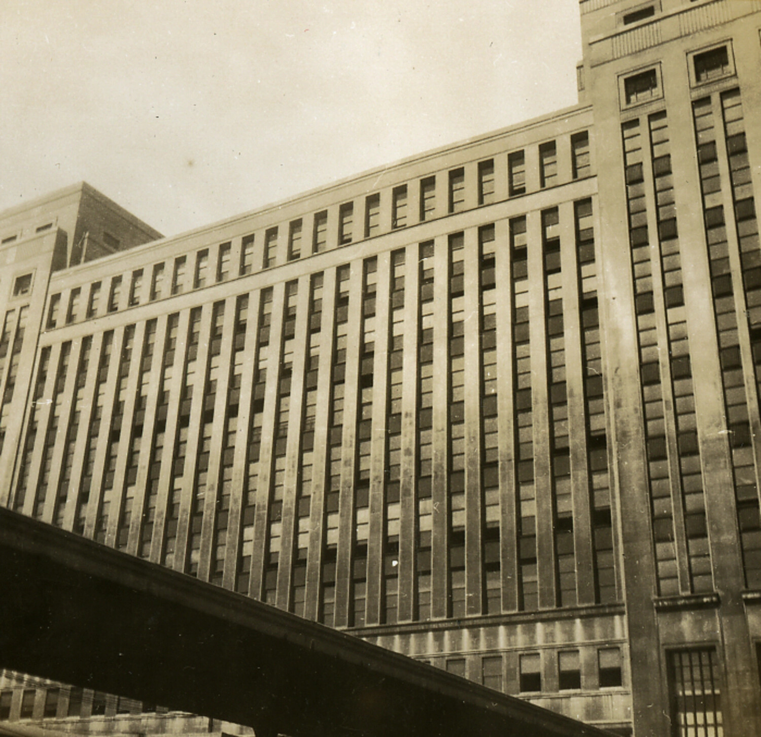 Large Multi-Story Office Building with Elevated Rail Viaduct, Postwar Japan, 1950s