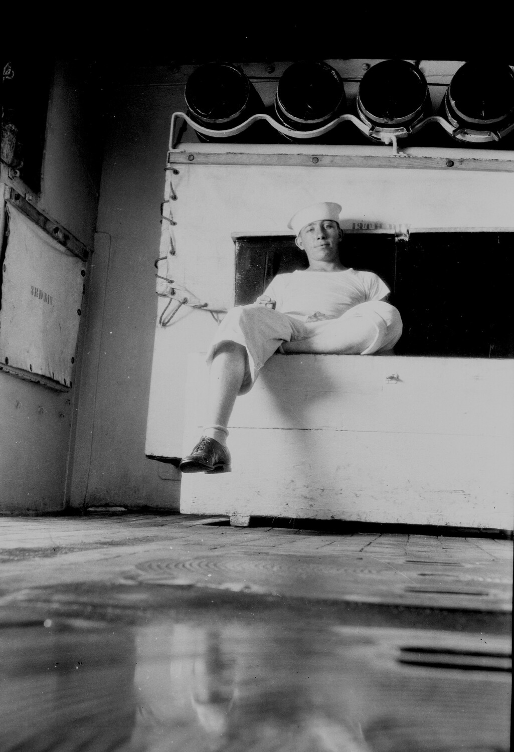 U.S. Navy Sailor Seated in Bulkhead Opening Aboard Ship, 1930s China/Pacific Deployment