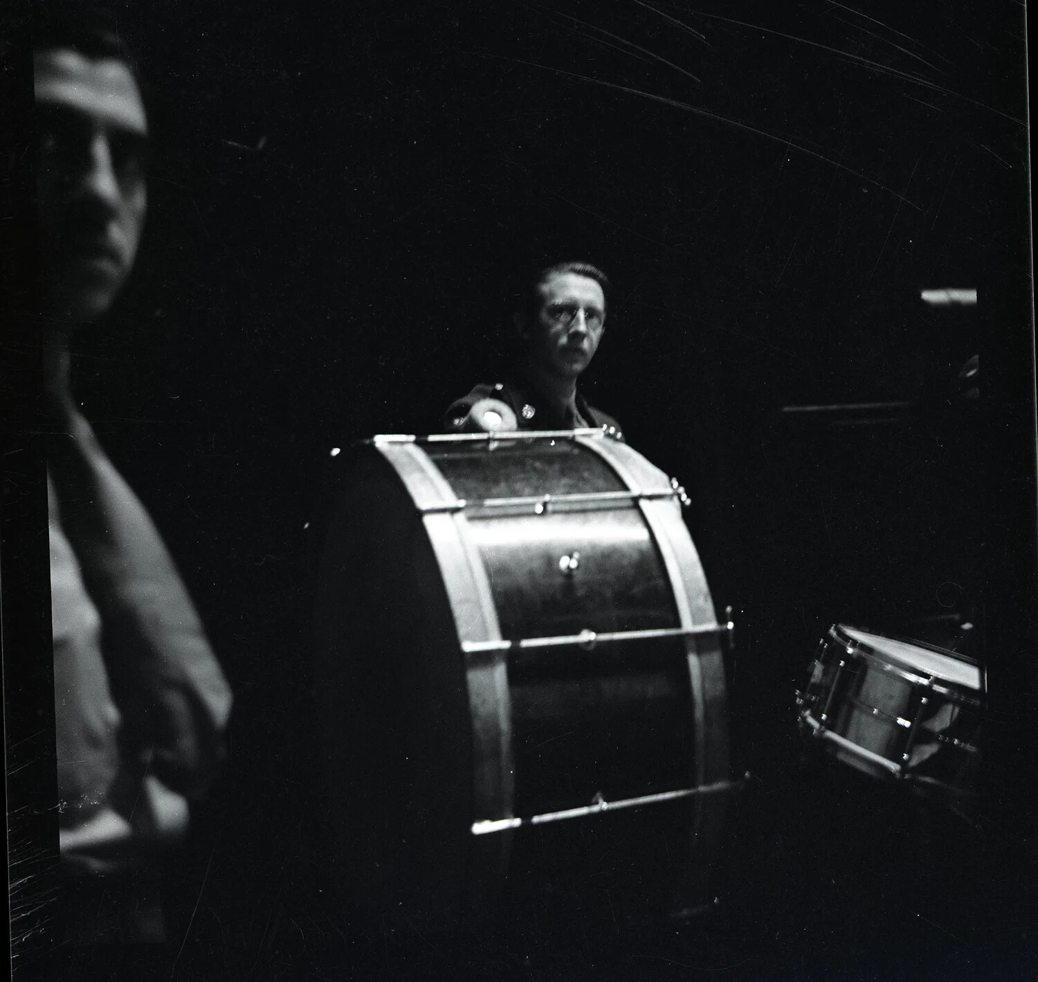 Military Bandsman with Concert Bass Drum on Stage