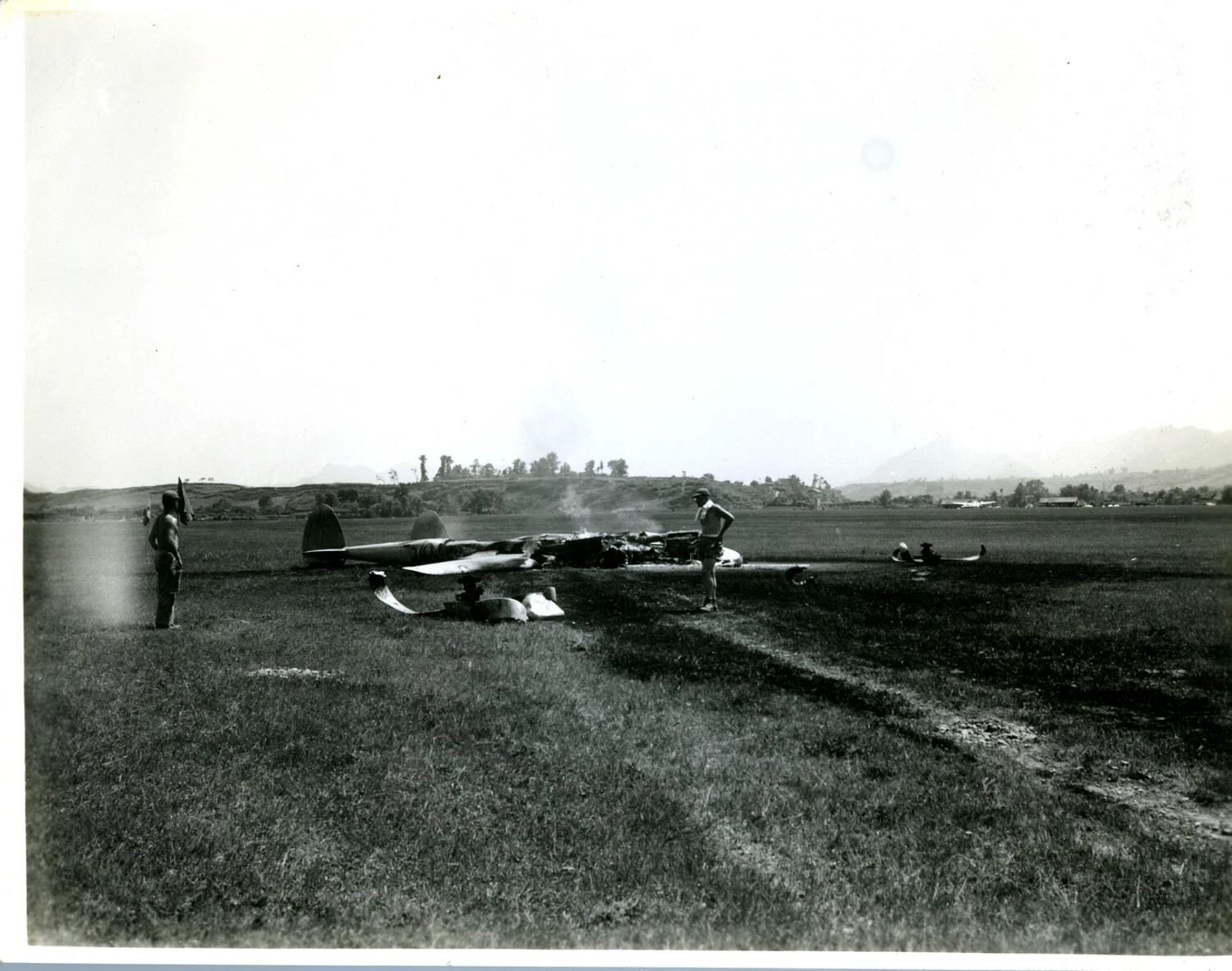 Wreckage of Twin-Boom Aircraft After Crash on Open Field, CBI Theater, World War II