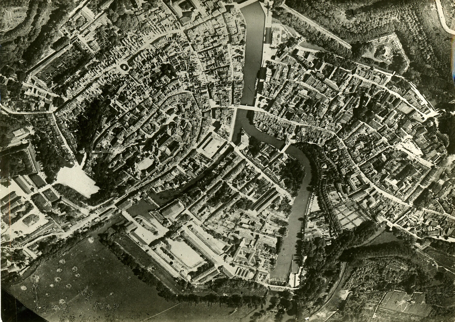 Aerial Reconnaissance Photograph of European Town on River Bend, WWII Era