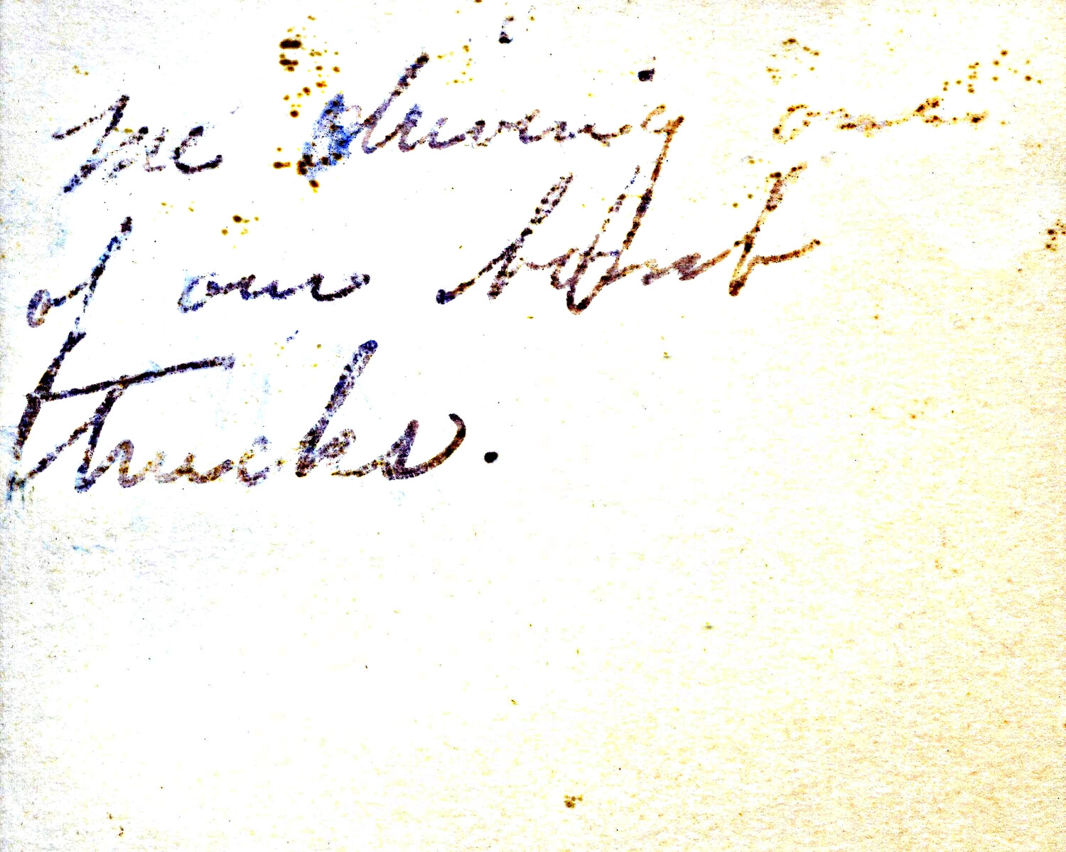 Handwritten Caption Card: '[Picture] Showing One of Our Motor Trucks'