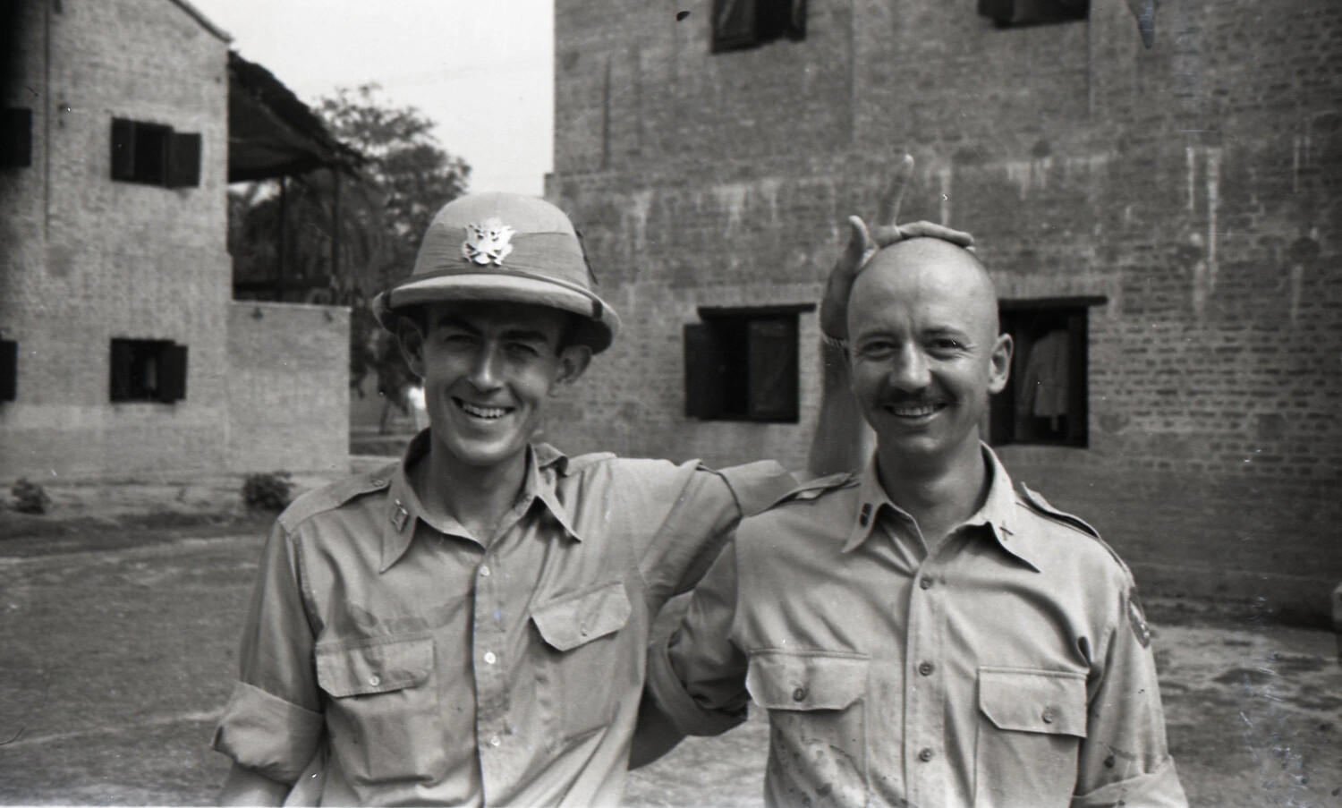 Two American Servicemen in Khaki Uniform, One Wearing Pith Helmet, China-Burma-India Theater, WWII