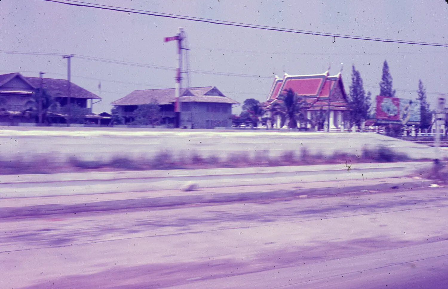 Southeast Asian Roadside Scene with Buddhist Temple, Vietnam War Era (Color Slide)