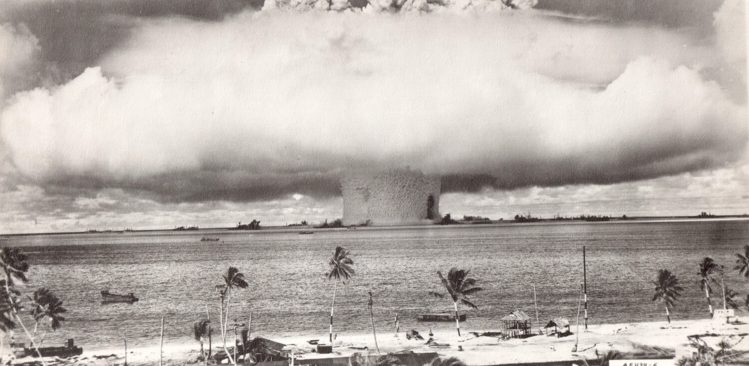Nuclear Test Detonation Cloud Viewed from Palm-Lined Shoreline, Bikini Atoll
