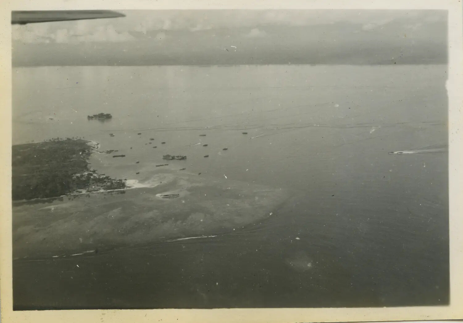 Aerial View of Landing Craft Near Coastal Point, Taken From Aircraft, 312th Bomb Group Collection, WWII Pacific Theater
