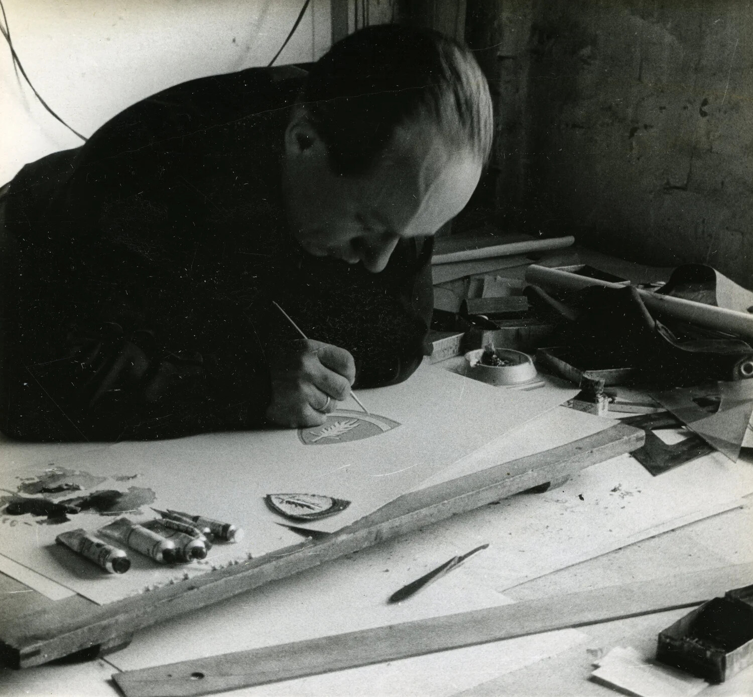 Artist Hand-Painting an Emblem, Close Detail View