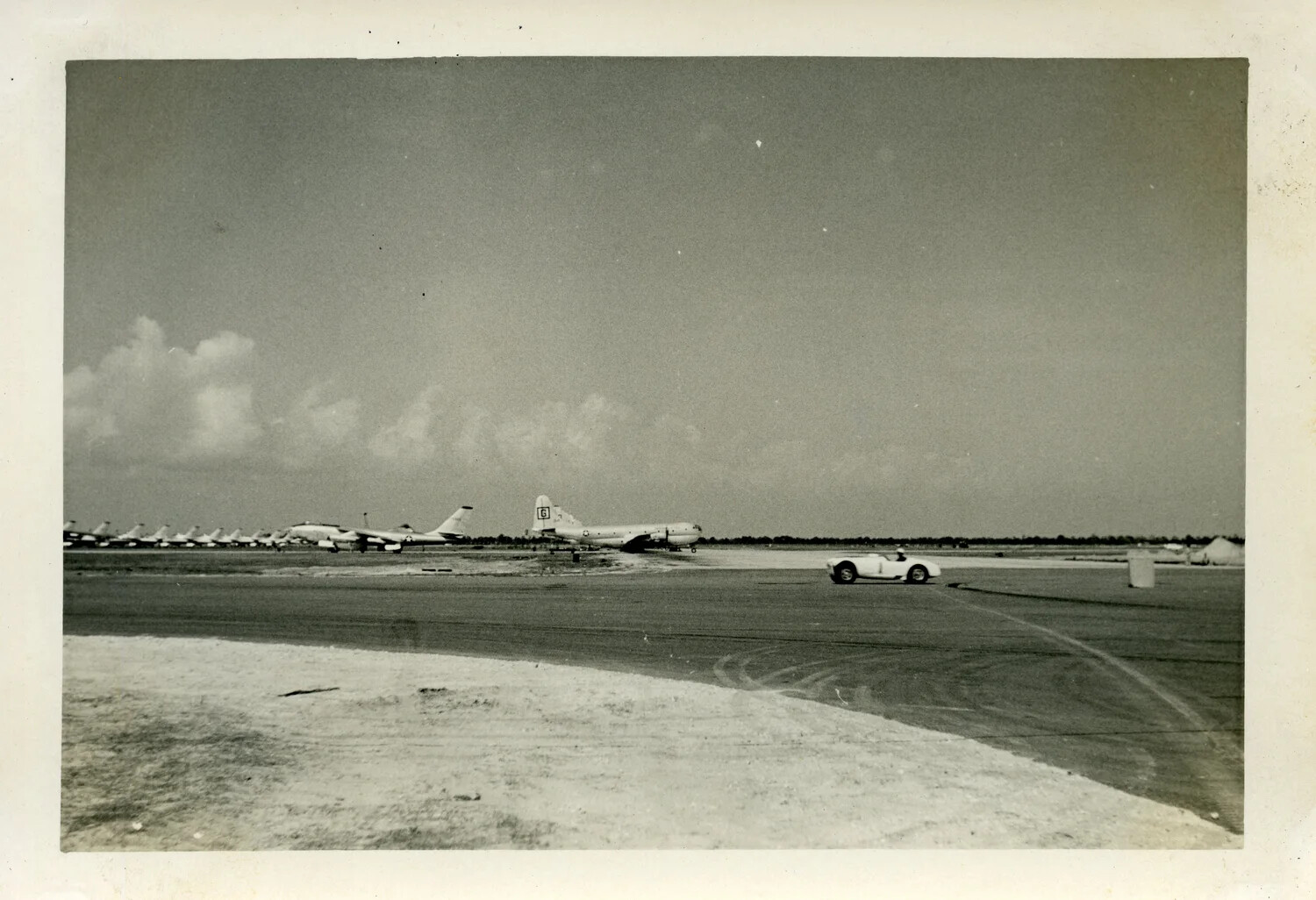USAF Flight Line with B-47 Stratojet Bombers, KC-97 Stratofreighter Tanker, and Personal Sports Car