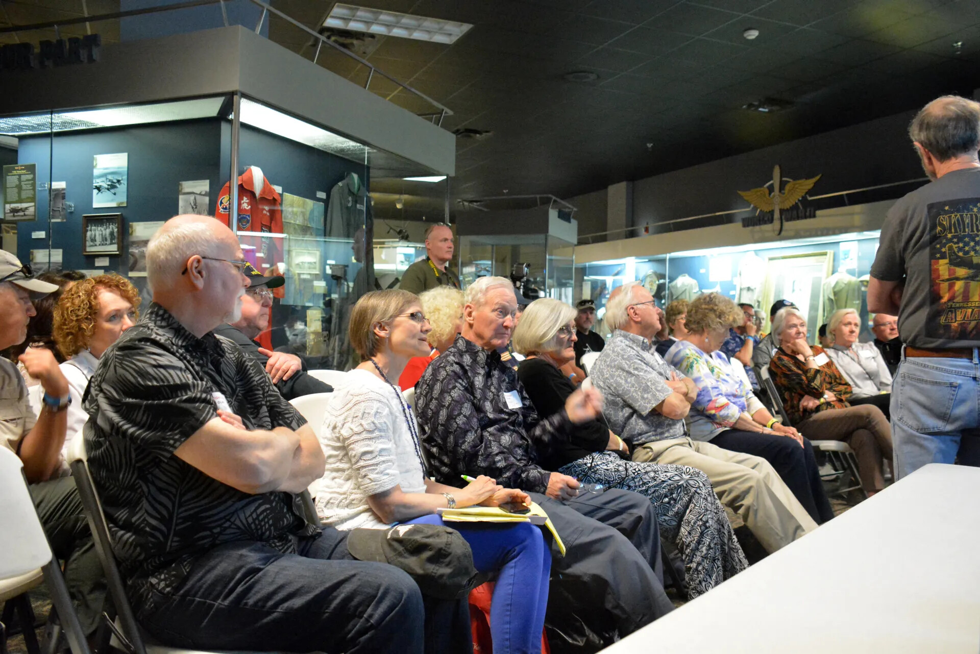 Wide View of Reunion Audience Amid Museum Exhibit Cases, Skyraider Association Meeting, 2 May 2015
